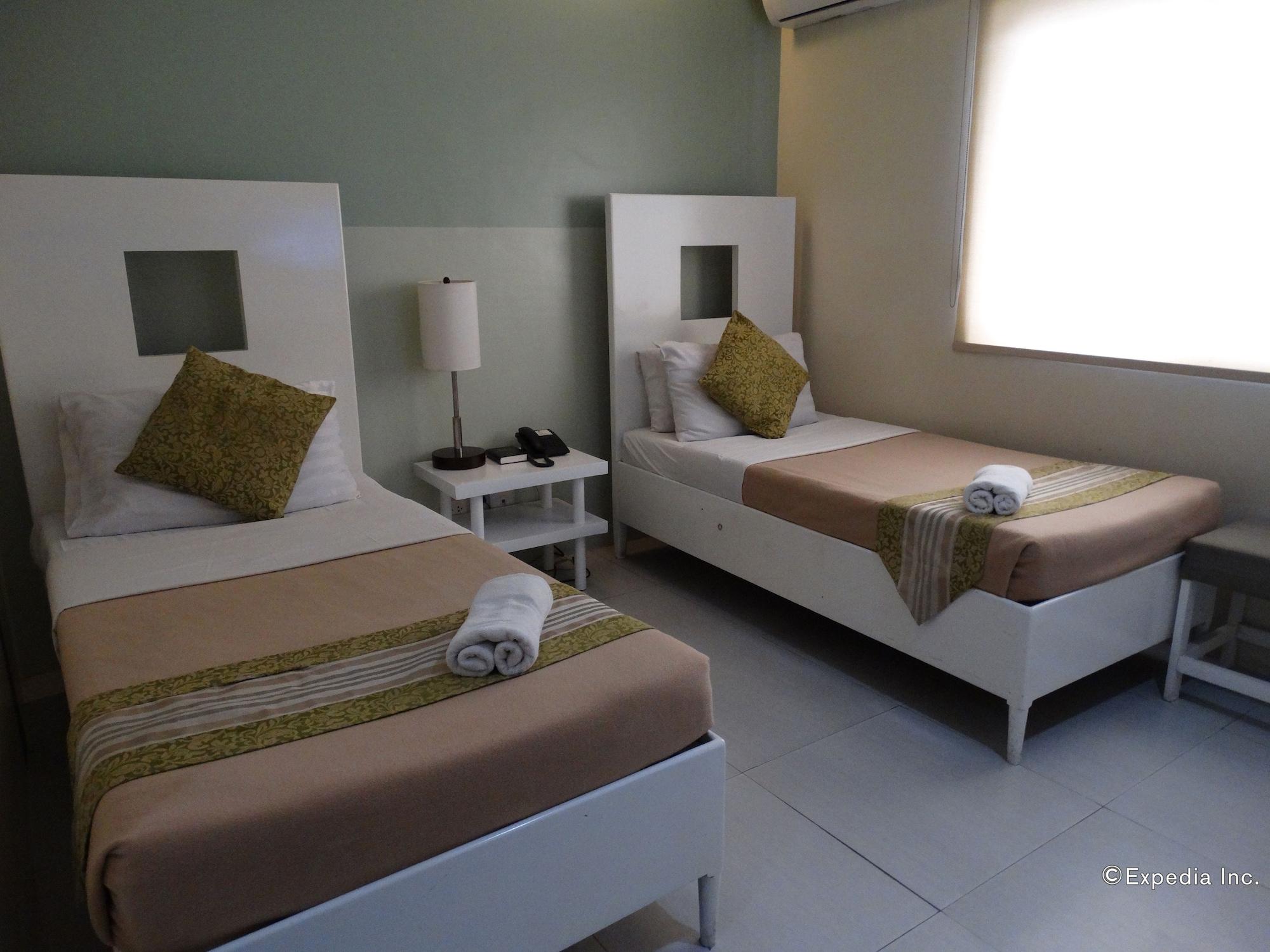 Empire Suites Hotel Puerto Princesa Exterior photo