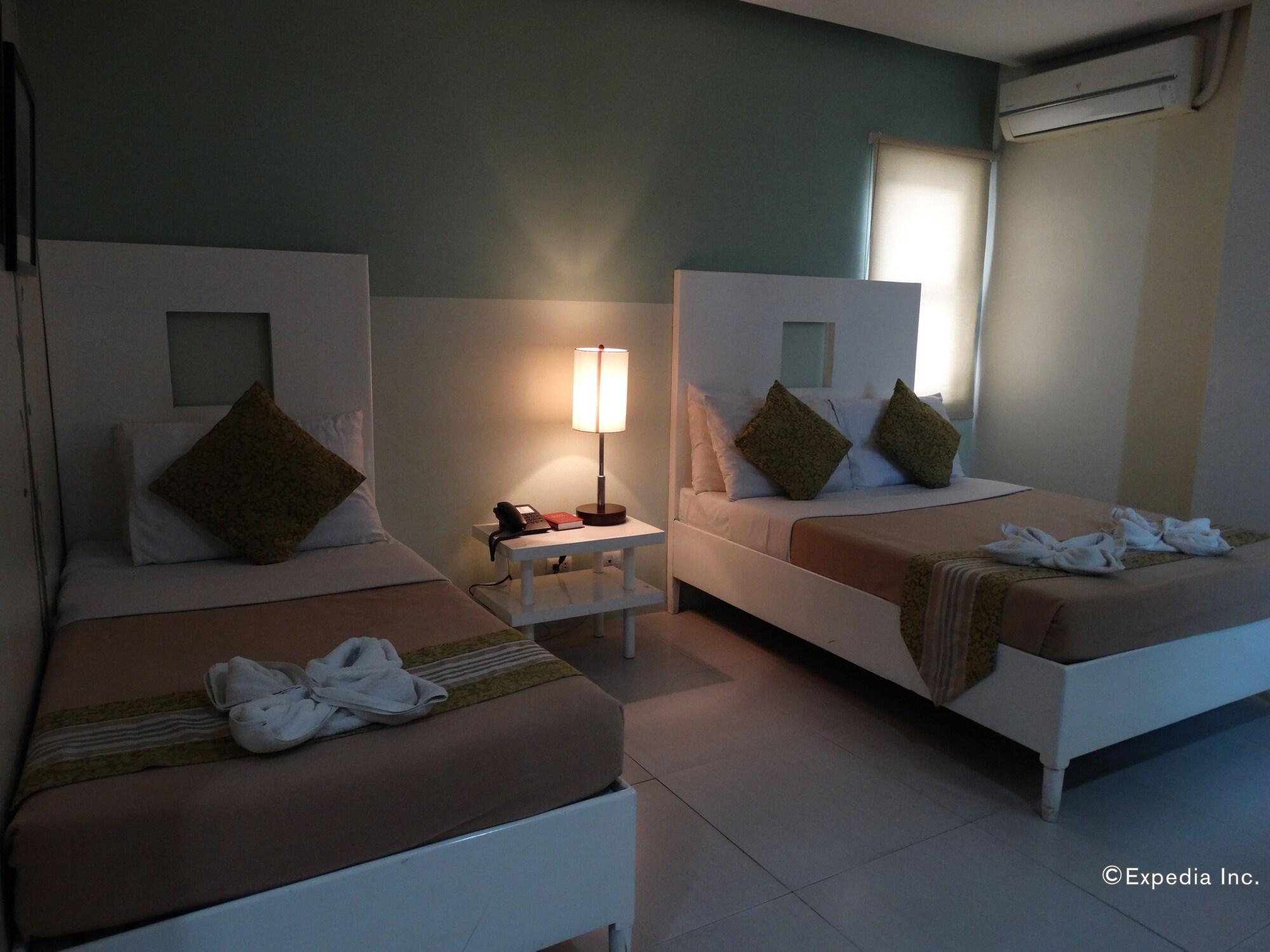 Empire Suites Hotel Puerto Princesa Exterior photo