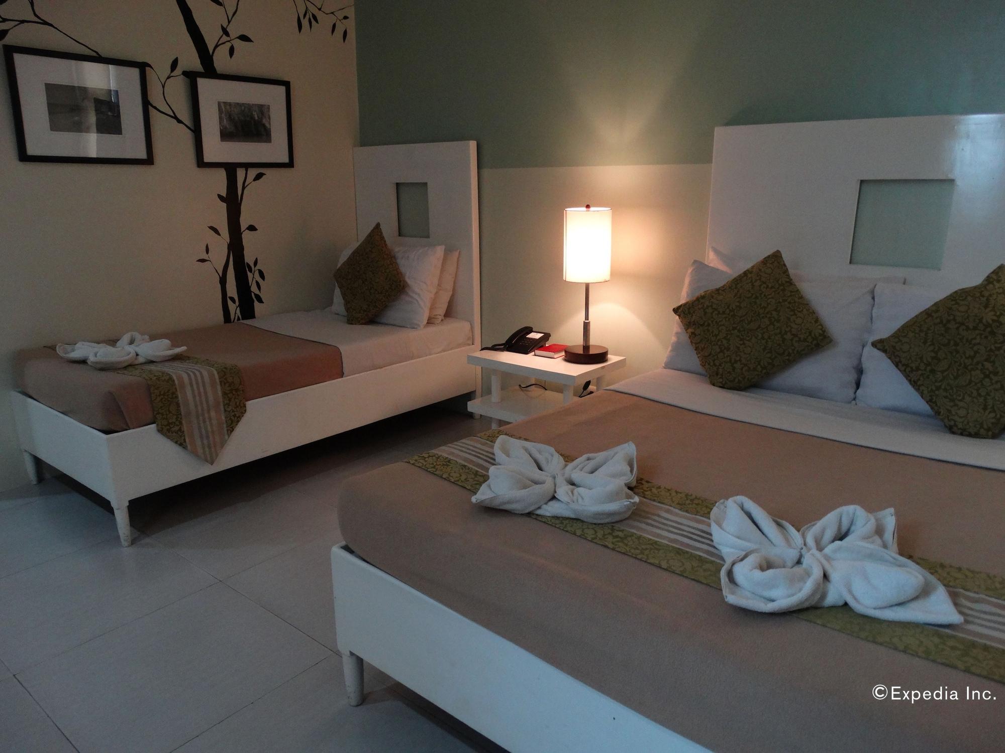 Empire Suites Hotel Puerto Princesa Exterior photo