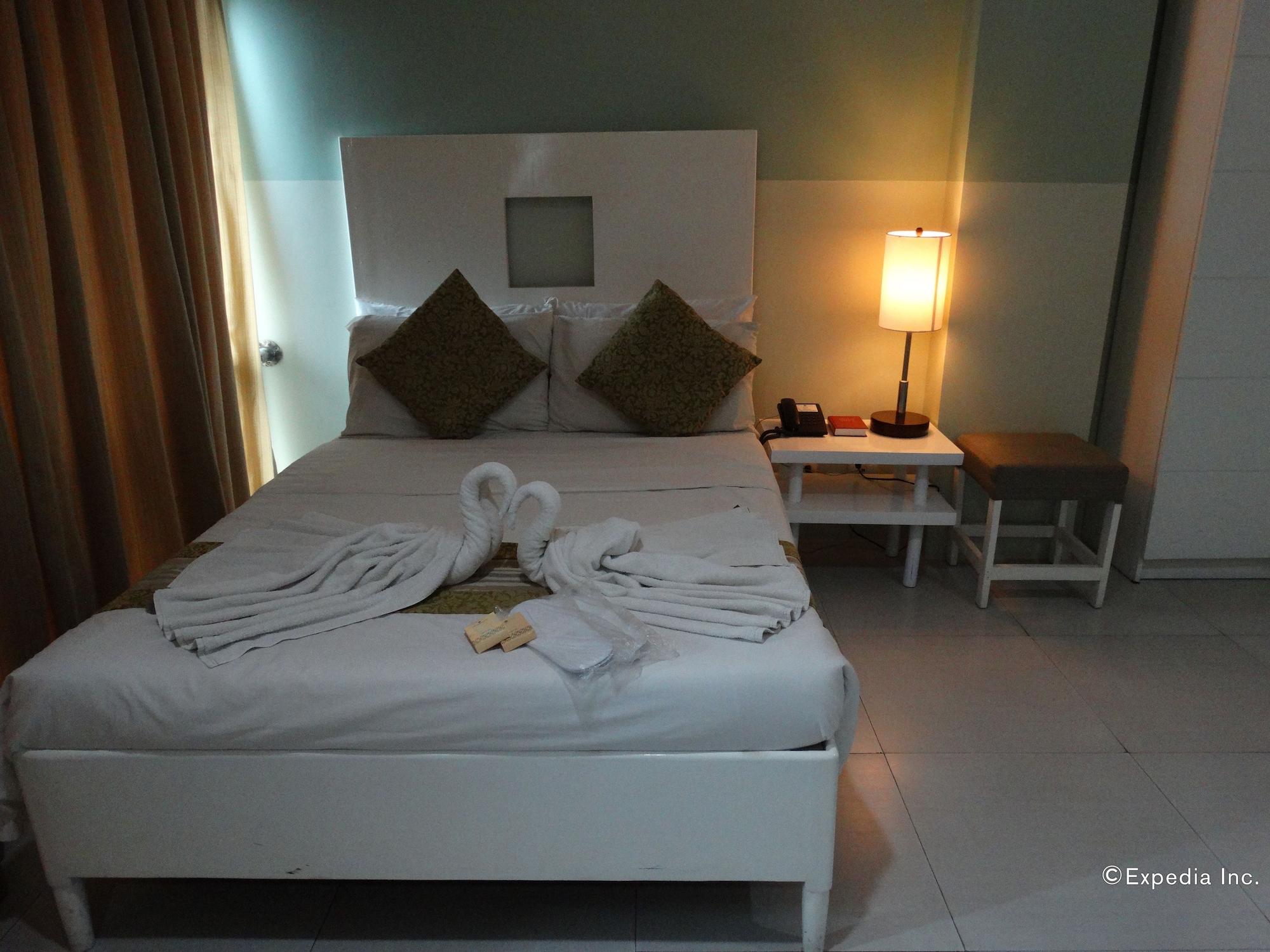 Empire Suites Hotel Puerto Princesa Exterior photo