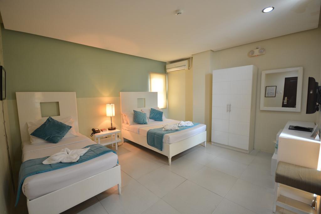 Empire Suites Hotel Puerto Princesa Exterior photo