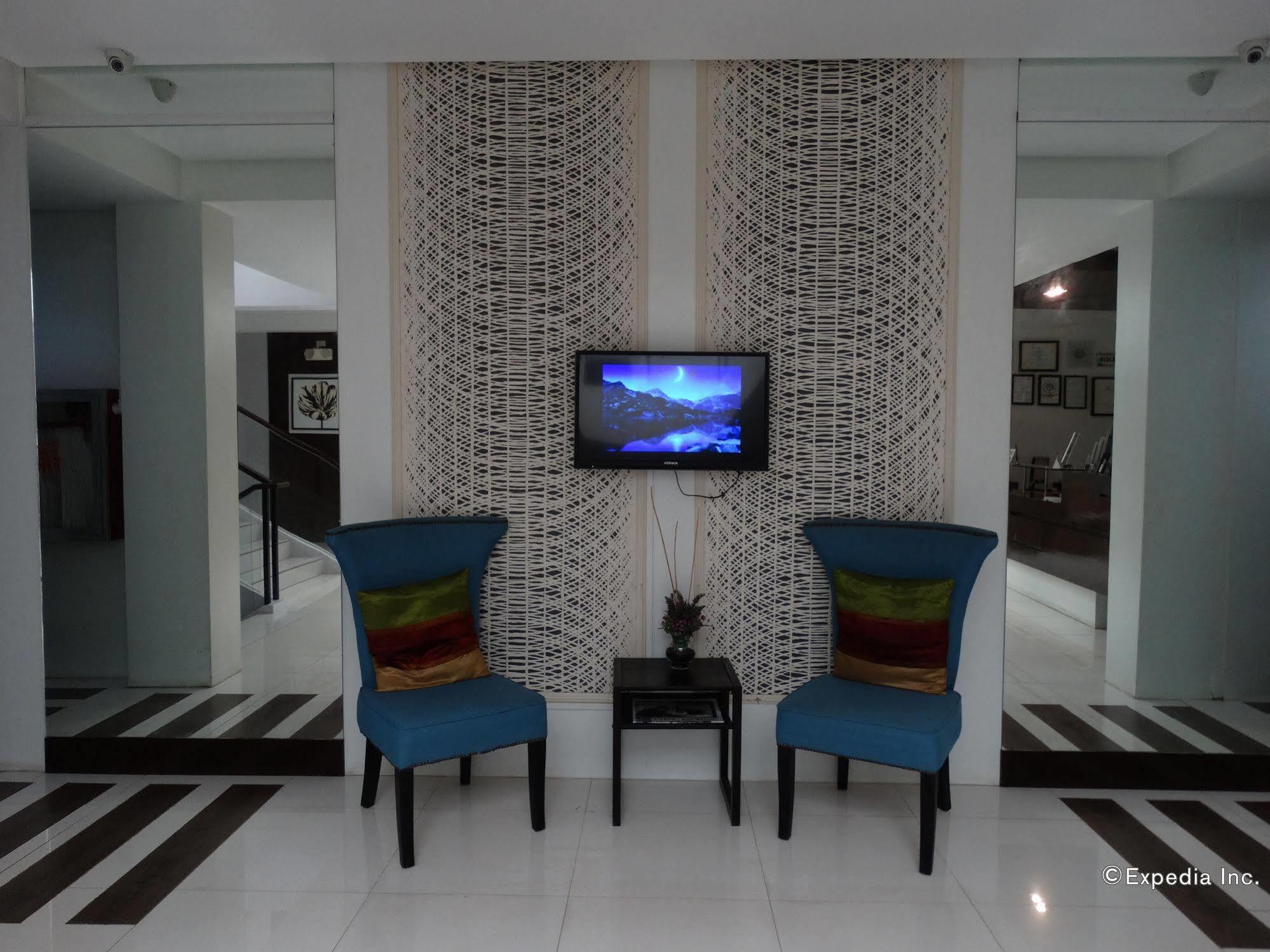 Empire Suites Hotel Puerto Princesa Exterior photo
