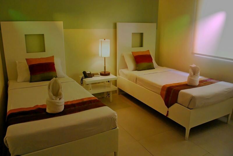 Empire Suites Hotel Puerto Princesa Exterior photo