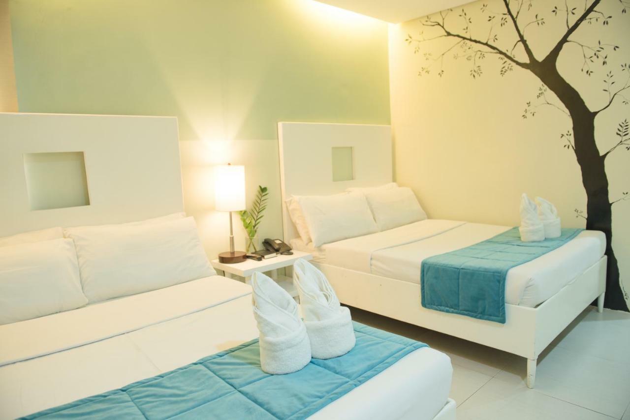 Empire Suites Hotel Puerto Princesa Exterior photo